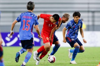 日本vs足球(日本足球与国足比赛)